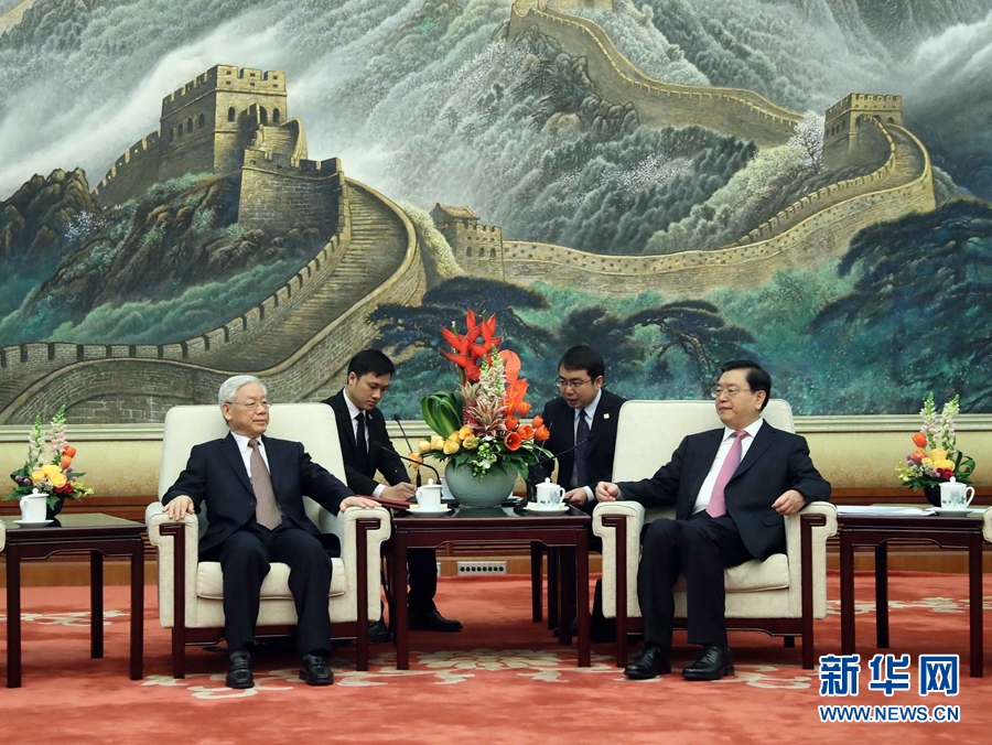 1月13日，中共中央政治局常委、全國(guó)人大常委會(huì)委員長(zhǎng)張德江在北京人民大會(huì)堂會(huì)見越共中央總書記阮富仲。 新華社記者 劉衛(wèi)兵 攝