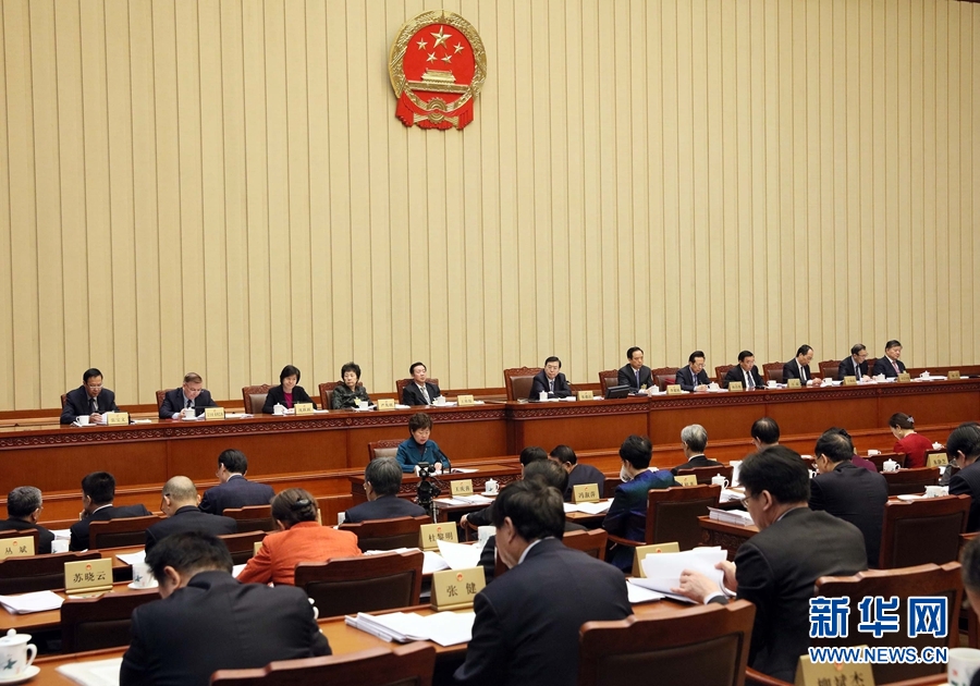 12月24日，十二屆全國人大常委會第三十一次會議在北京人民大會堂舉行第三次全體會議。張德江委員長出席會議。新華社記者 劉衛(wèi)兵 攝