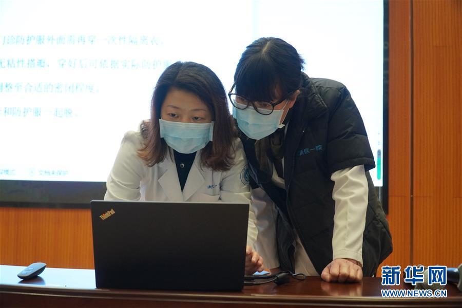 （聚焦疫情防控·圖文互動）（5）無法握手，但始終并肩