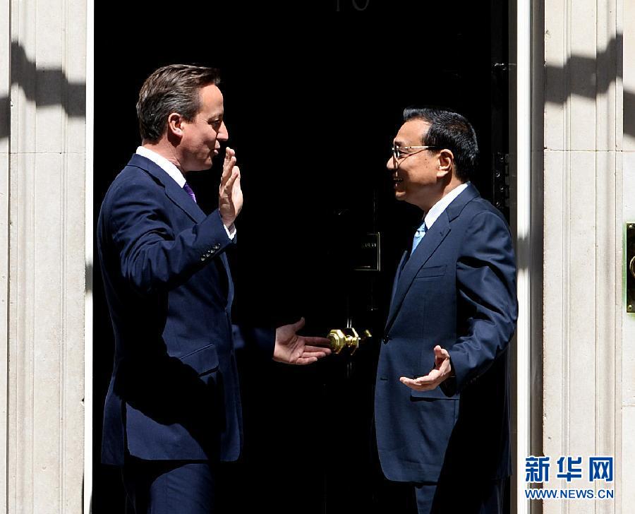 6月17日，中國國務(wù)院總理李克強在倫敦唐寧街10號首相府同英國首相卡梅倫舉行中英總理年度會晤。新華社記者 李濤 攝