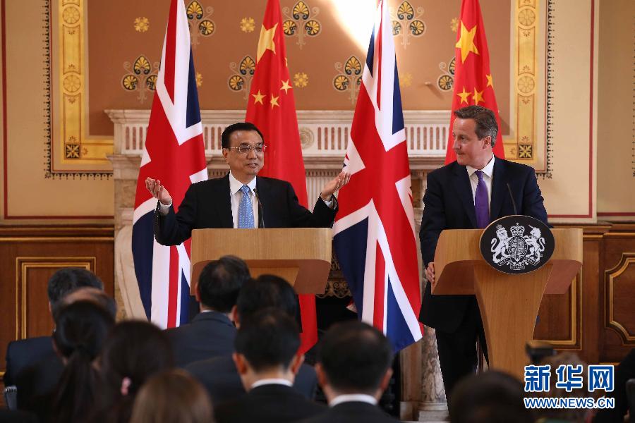 6月17日，國務(wù)院總理李克強同英國首相卡梅倫在倫敦舉行中英總理年度會晤后共同會見記者。新華社記者 龐興雷 攝