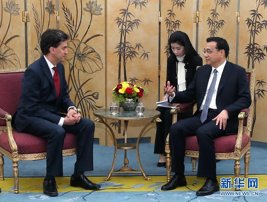 6月18日，國務院總理李克強在倫敦會見英國工黨領袖埃德·米利班德。新華社記者 龐興雷 攝