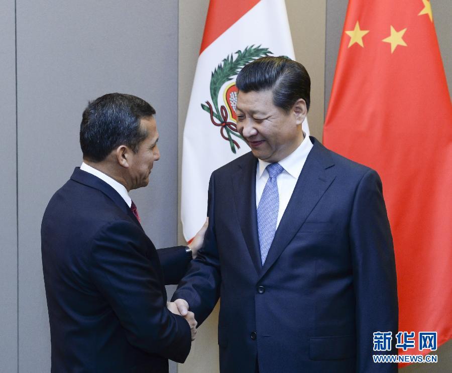 7月16日，國家主席習近平在巴西首都巴西利亞會見秘魯總統(tǒng)烏馬拉。新華社記者 劉建生 攝 