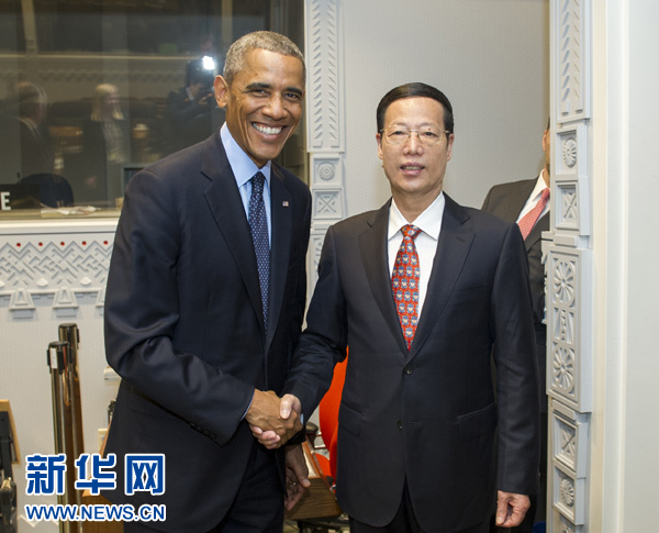 9月23日，國家主席習(xí)近平特使、國務(wù)院副總理張高麗在紐約會見出席聯(lián)合國氣候峰會的美國總統(tǒng)奧巴馬。 新華社記者王曄攝