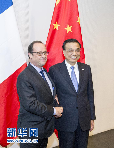 10月16日，中國國務(wù)院總理李克強在米蘭會見法國總統(tǒng)奧朗德。新華社記者 王曄 攝