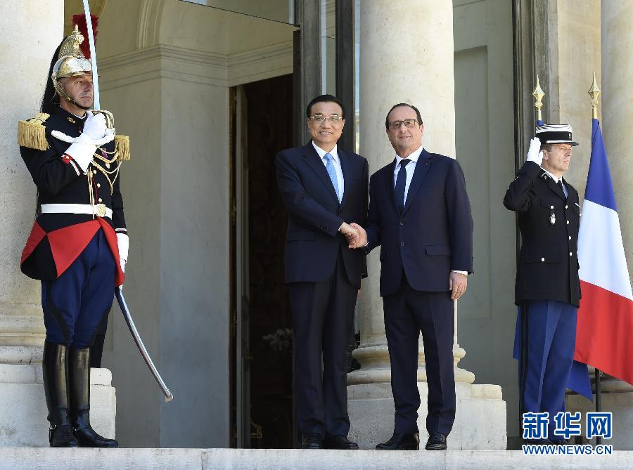 當?shù)貢r間6月30日下午，國務院總理李克強在巴黎愛麗舍宮會見法國總統(tǒng)奧朗德。 新華社記者李學仁攝