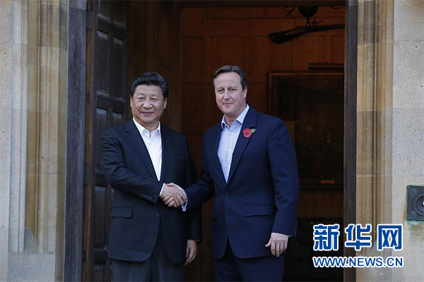 10月22日，國(guó)家主席習(xí)近平在契克斯首相鄉(xiāng)間別墅同英國(guó)首相卡梅倫再次會(huì)晤。新華社記者 鞠鵬 攝