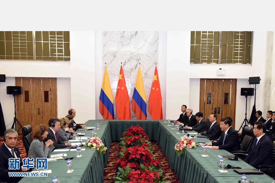11月18日，國家主席習(xí)近平在菲律賓馬尼拉會見哥倫比亞總統(tǒng)桑托斯。 新華社記者 饒愛民 攝