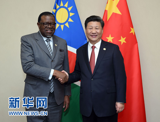 12月4日，國(guó)家主席習(xí)近平在約翰內(nèi)斯堡會(huì)見納米比亞總統(tǒng)根哥布。 新華社記者 張鐸 攝
