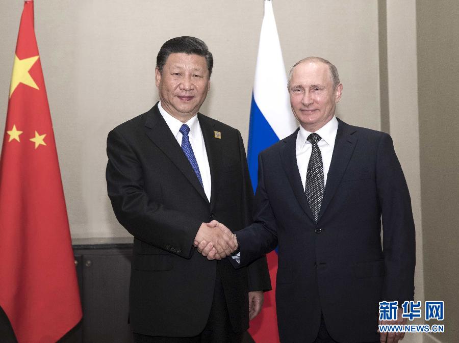6月8日，國家主席習(xí)近平在阿斯塔納會(huì)見俄羅斯總統(tǒng)普京。 新華社記者蘭紅光 攝
