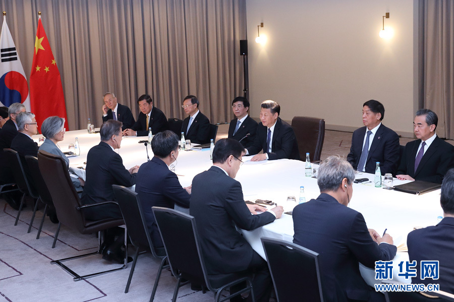 7月6日，國家主席習(xí)近平在柏林會見韓國總統(tǒng)文在寅。 新華社記者 王曄攝
