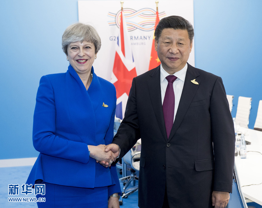 7月7日，國(guó)家主席習(xí)近平在漢堡會(huì)見(jiàn)英國(guó)首相特雷莎·梅。 新華社記者李學(xué)仁 攝